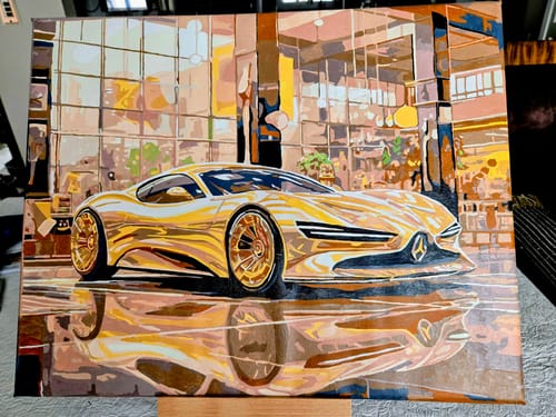 Reviewer's completed Number Artist painting showing a vibrant golden sports car in front of a modern building with its reflection.