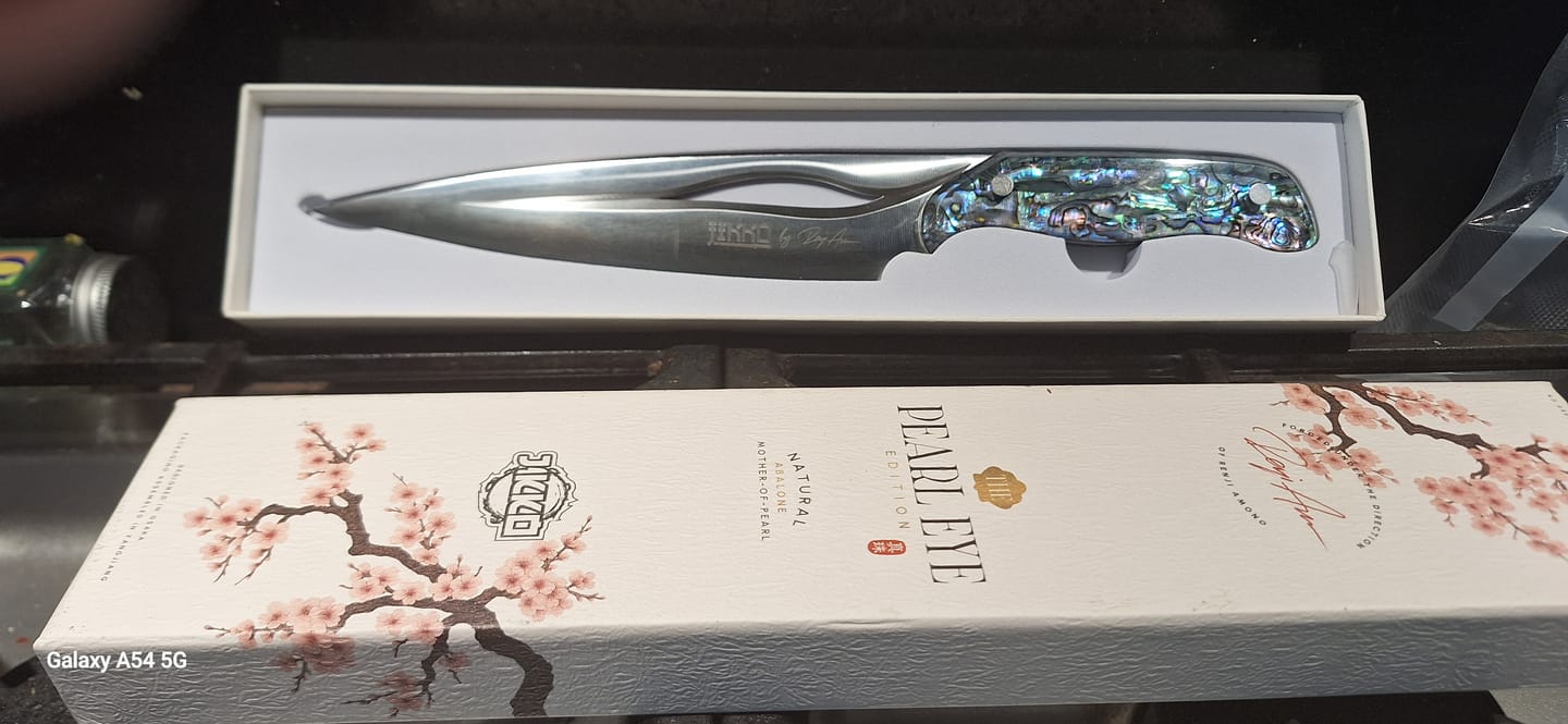 Customer photo review of The Pearl Eye Edition – Signature Knife by JIKKO®