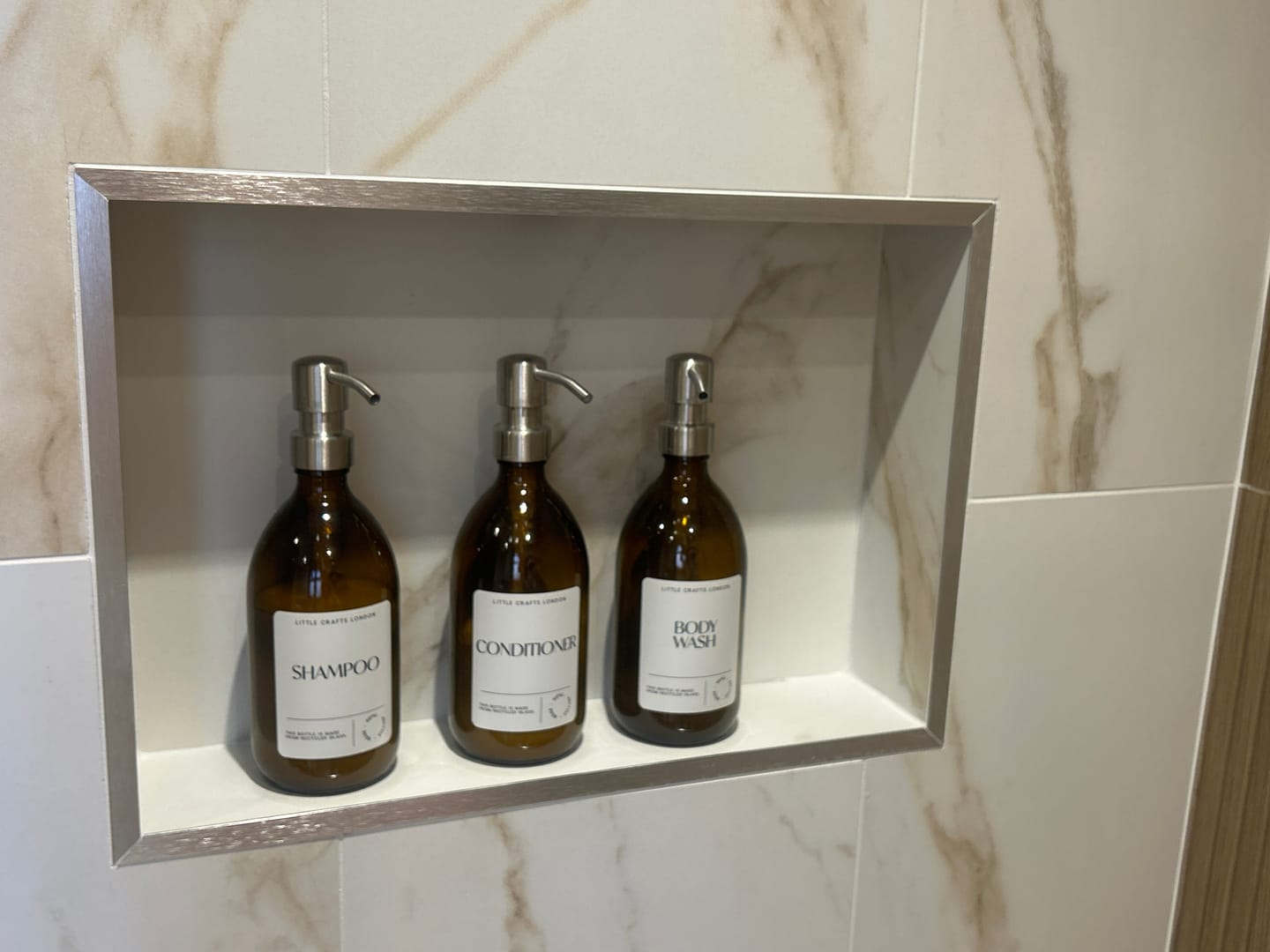 Customer photo review of Set of 3 Bathroom Reusable Amber Glass Bottles 500 ML with Metal Pump