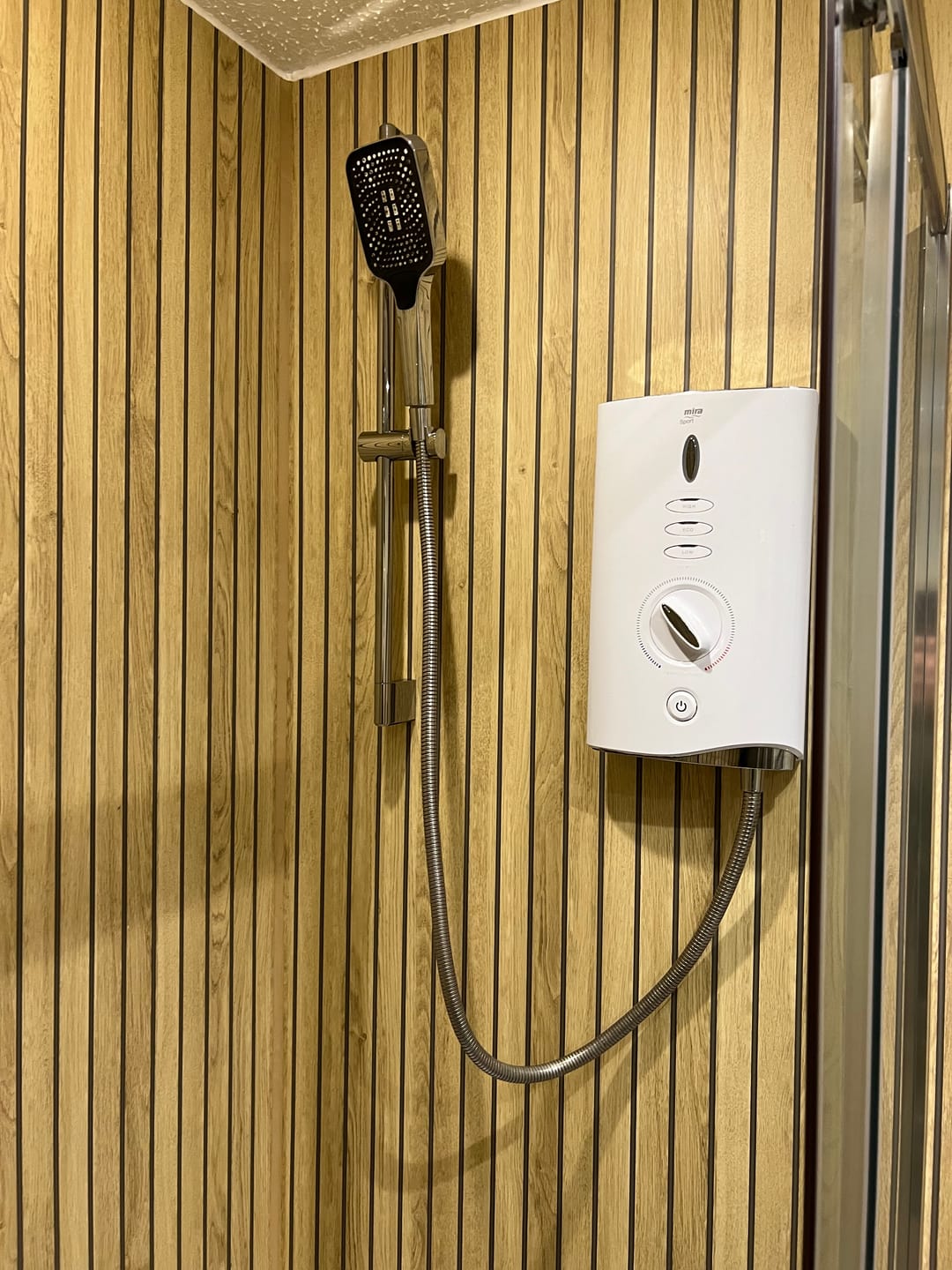 Customer photo review of Sivara Oak Slatted Wood Effect PVC Waterproof Shower Panel