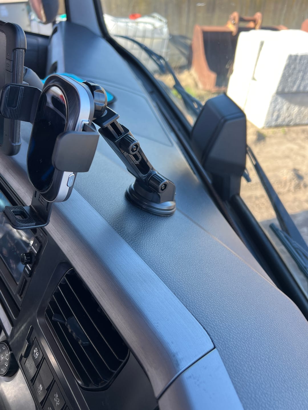 Customer photo review of Tough On Wireless Car Charger Auto Clamping Phone Holder