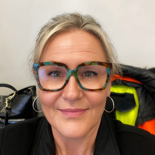 Reviewer wearing glasses shows a subtle, lovely look with her Infinaluxe Pre-Glued Lashes.