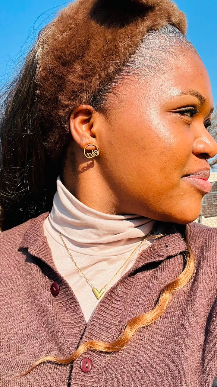 Customer photo review of Gold Era Logo Studs