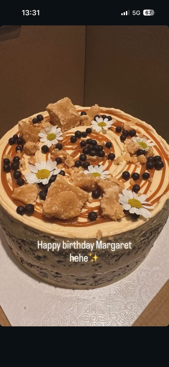 Customer photo review of chocolate caramel cake