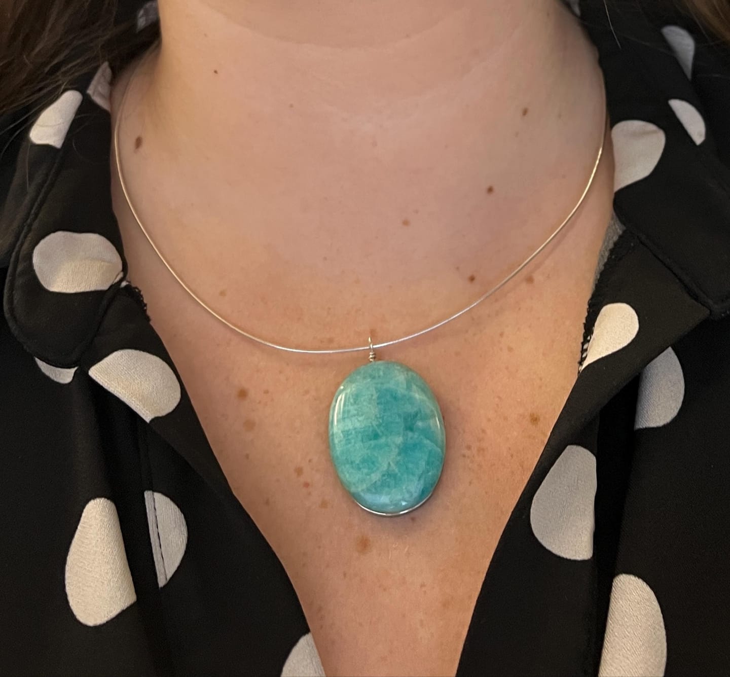 Customer photo review of Inner Strength Omega Necklace