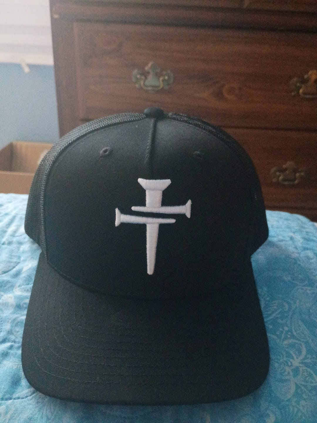 Customer photo review of DGO Cross of Nails Embroidered Trucker Hat