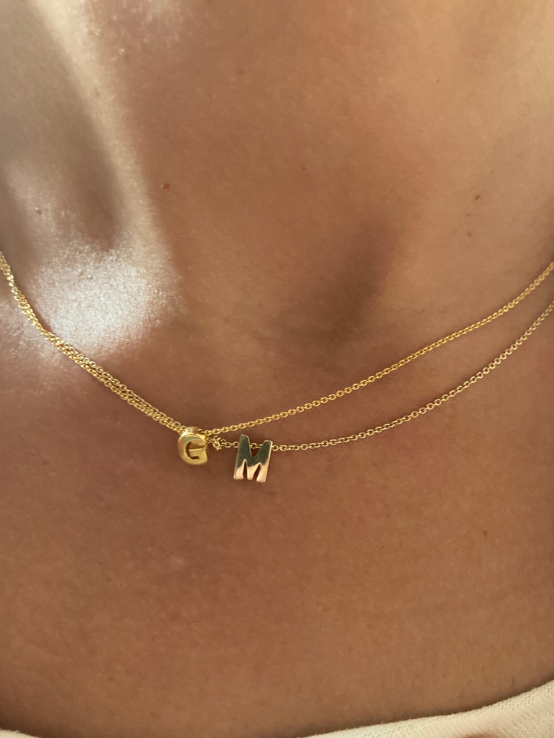 Customer photo review of Colar Letra
