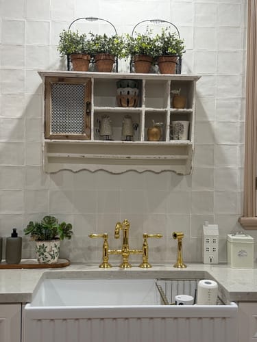 Customer's Guy French Country Wall Shelf Unit in distressed cream, installed on a tiled wall above a kitchen sink.