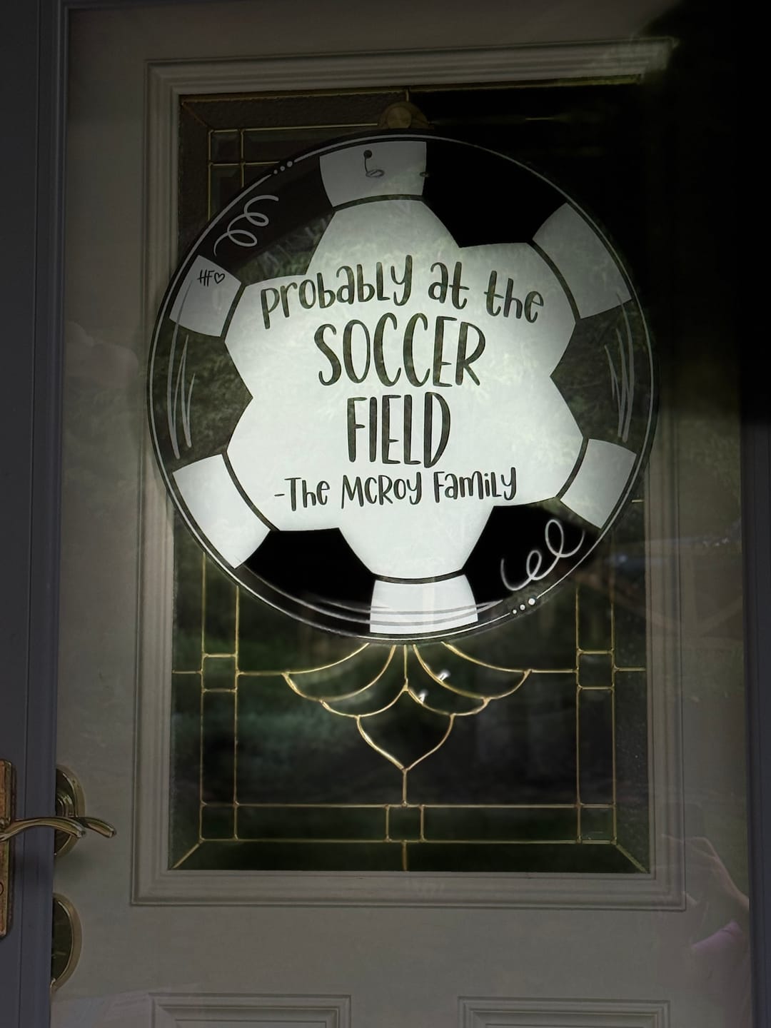 Customer photo review of Probably at the Soccer Field Custom Door Hanger