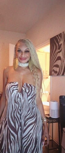Customer showing a close-up of the strapless Chiffon Print Jumpsuit's bodice with a U-wire detail.