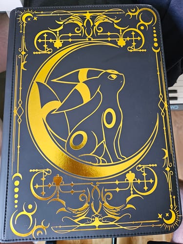 Customer photo review of Lunar Shadow 9-Pocket Trading Card Binder