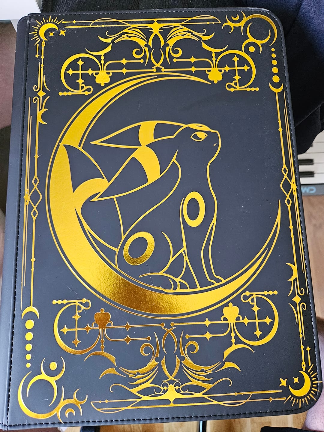 Customer photo review of Lunar Shadow 9-Pocket Trading Card Binder