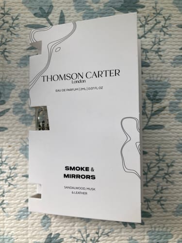 Customer's 2ml sample of Smoke & Mirrors Eau de Parfum shown in its white card packaging.