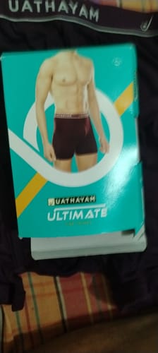 Customer's photo of the Uathayam Ultimate Fine trunks' packaging, with the actual dark trunks visible in the background.