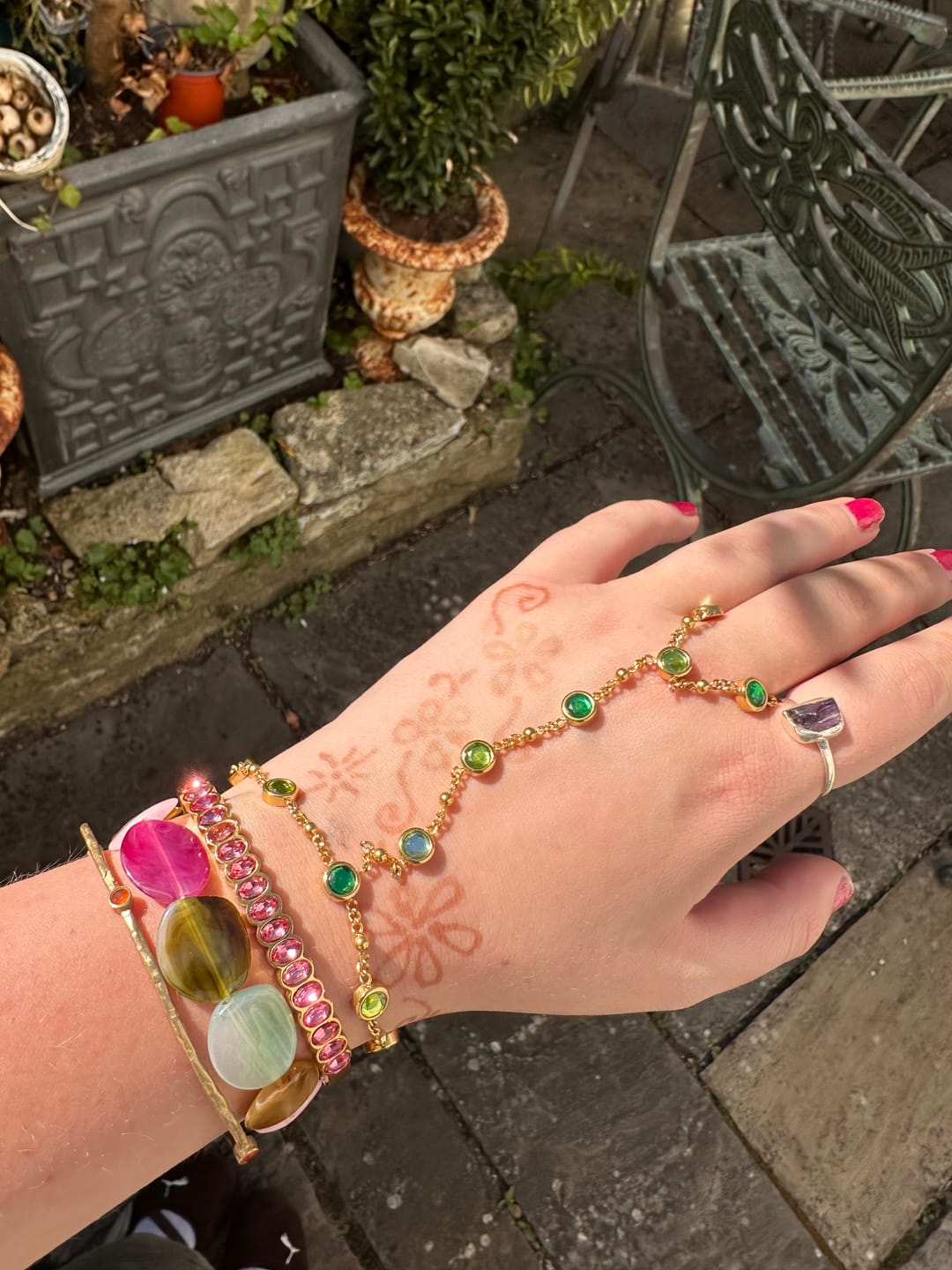 Customer photo review of Tshenolo Gold Green Hand Chain