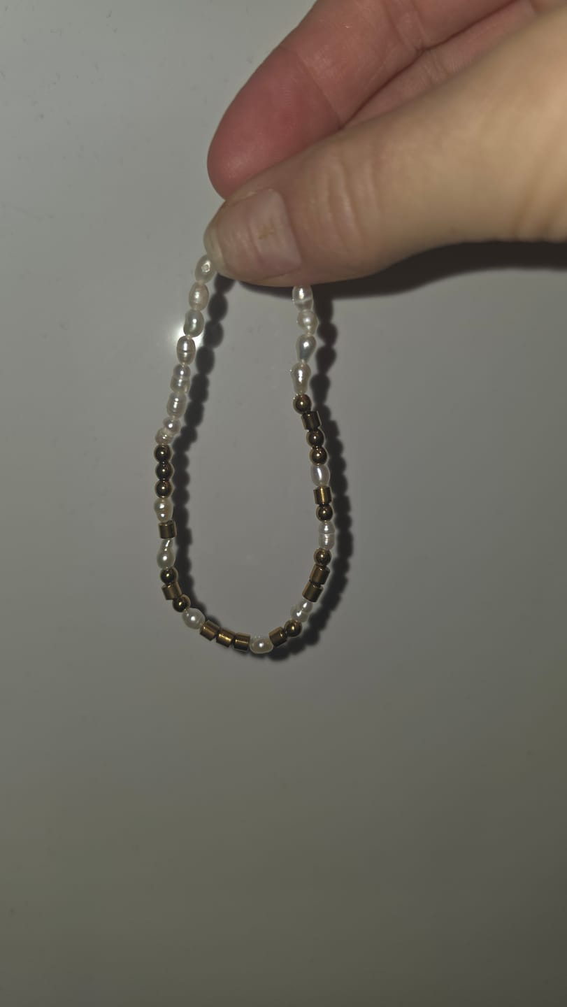 Customer photo review of Obsidian 'Strong as Fuck' Morse Code Bracelet