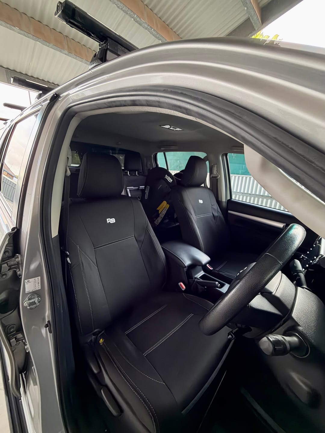 Customer photo review of Toyota Hilux 8th Gen - SR & SR5 with Cloth Seats - GP4 Neoprene 2x Front Seat Covers (In Stock)