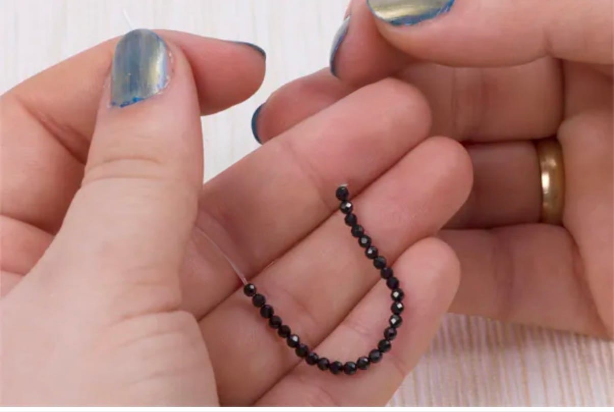 Customer photo review of Olivenorma Extra Fine 3mm Faceted Obsidian Bead Ring