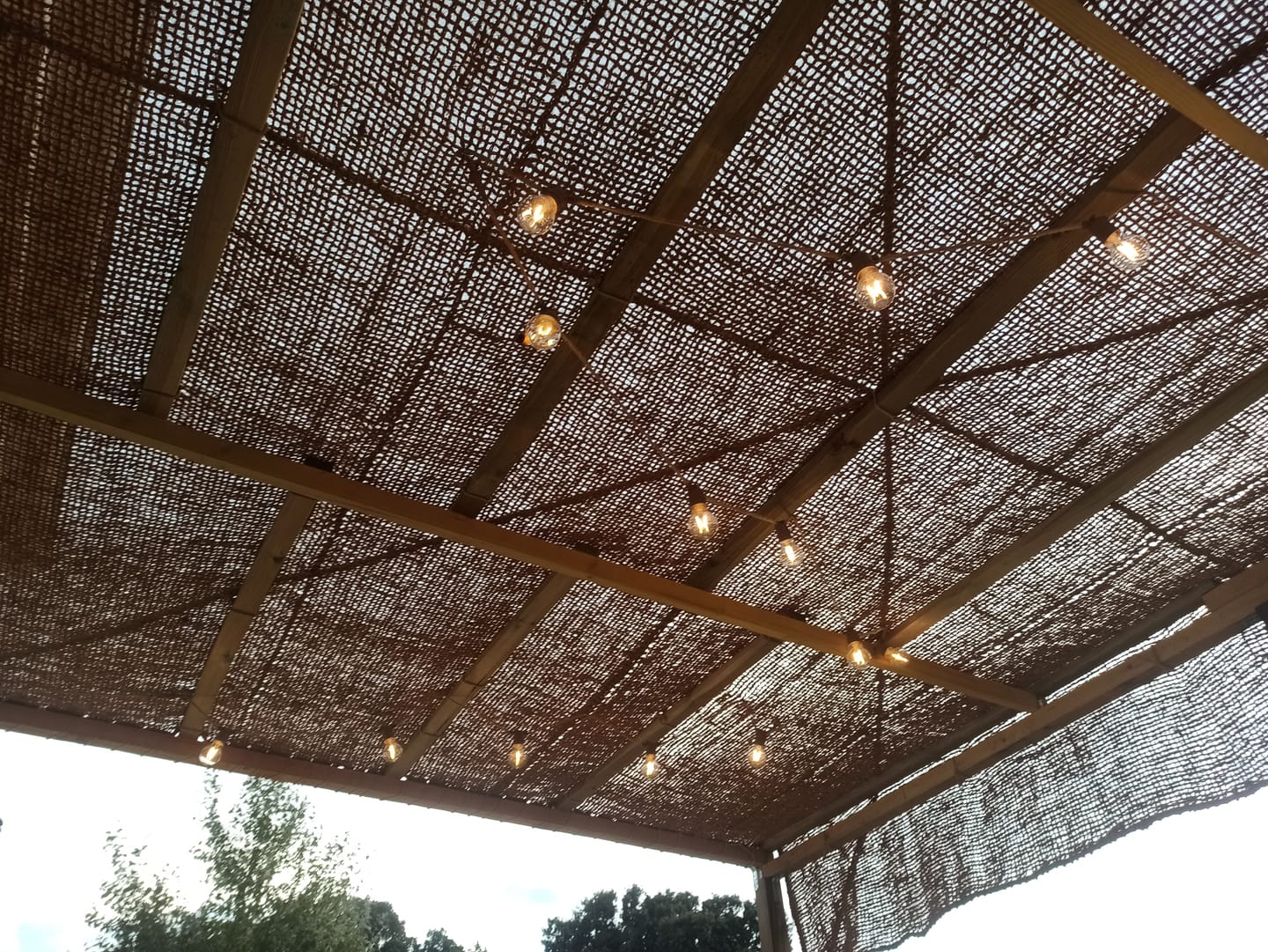 Customer photo review of Toile d'ombrage en fibre de coco pour pergola