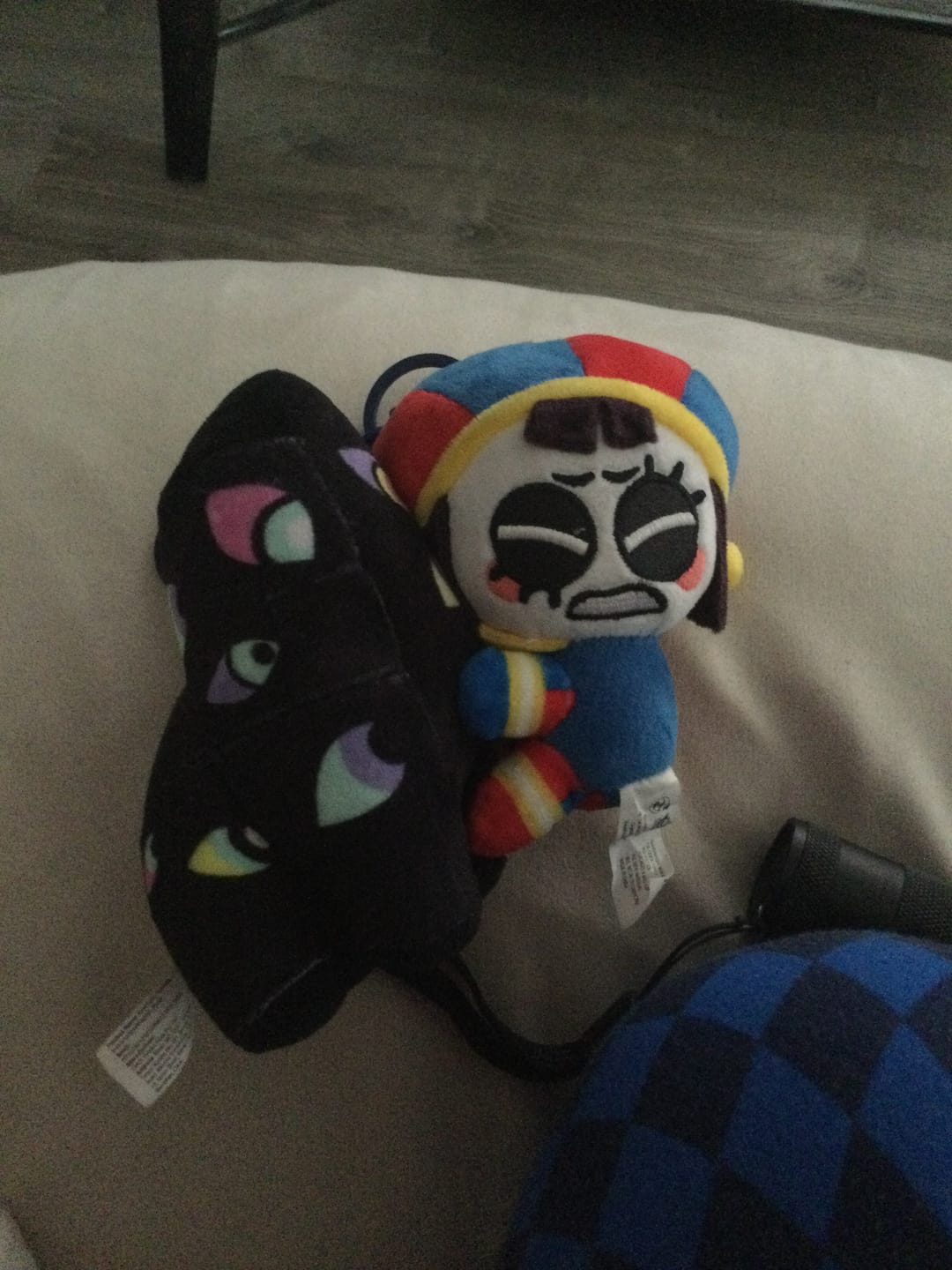 Customer photo review of Pomni & Abstraction Magnetic Plush Keychains