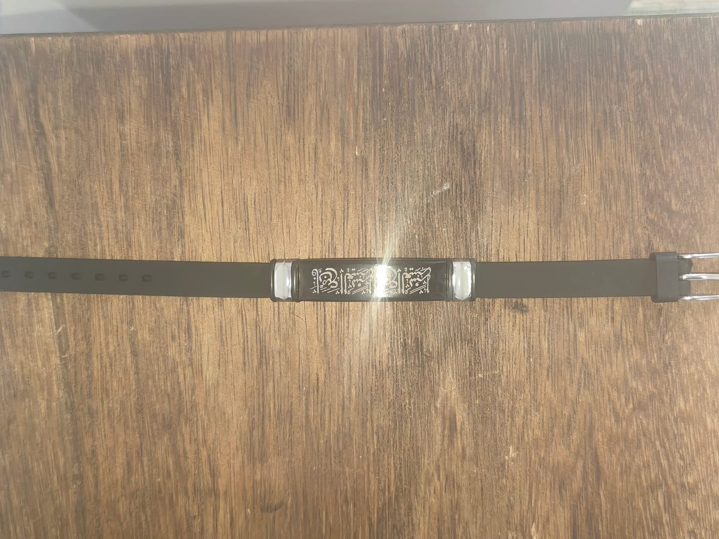 Customer photo review of HilalHaven Divine Presence Allah Calligraphy Adjustable Bracelet — Sleek Stainless Steel