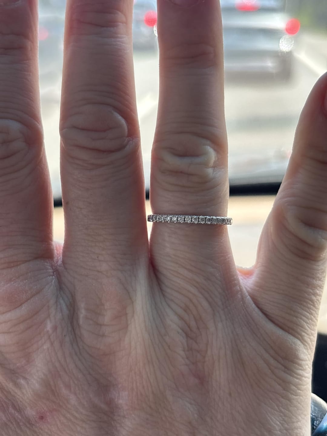 Customer photo review of S925 Half Halo Moissanite 0.5 Ct Round Cut White/Green Stone Anniversary Ring