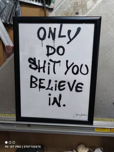Customer's DREAM art print shown in a black frame, displaying the text 'Only do shit you believe in.'