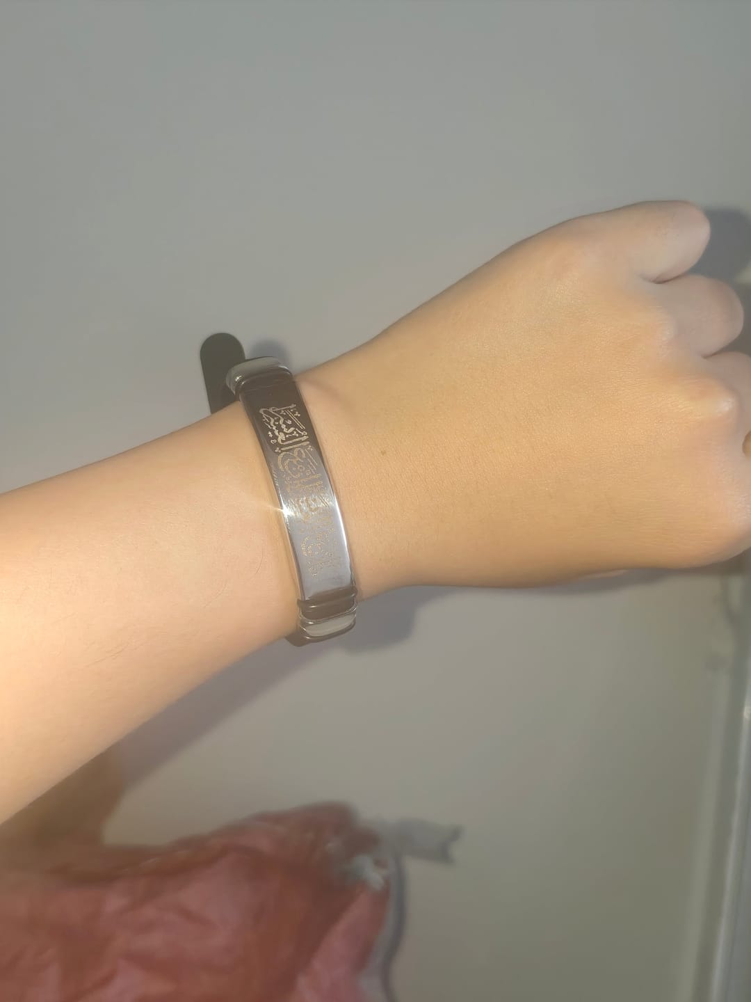 Customer photo review of HilalHaven Divine Presence Allah Calligraphy Adjustable Bracelet — Sleek Stainless Steel