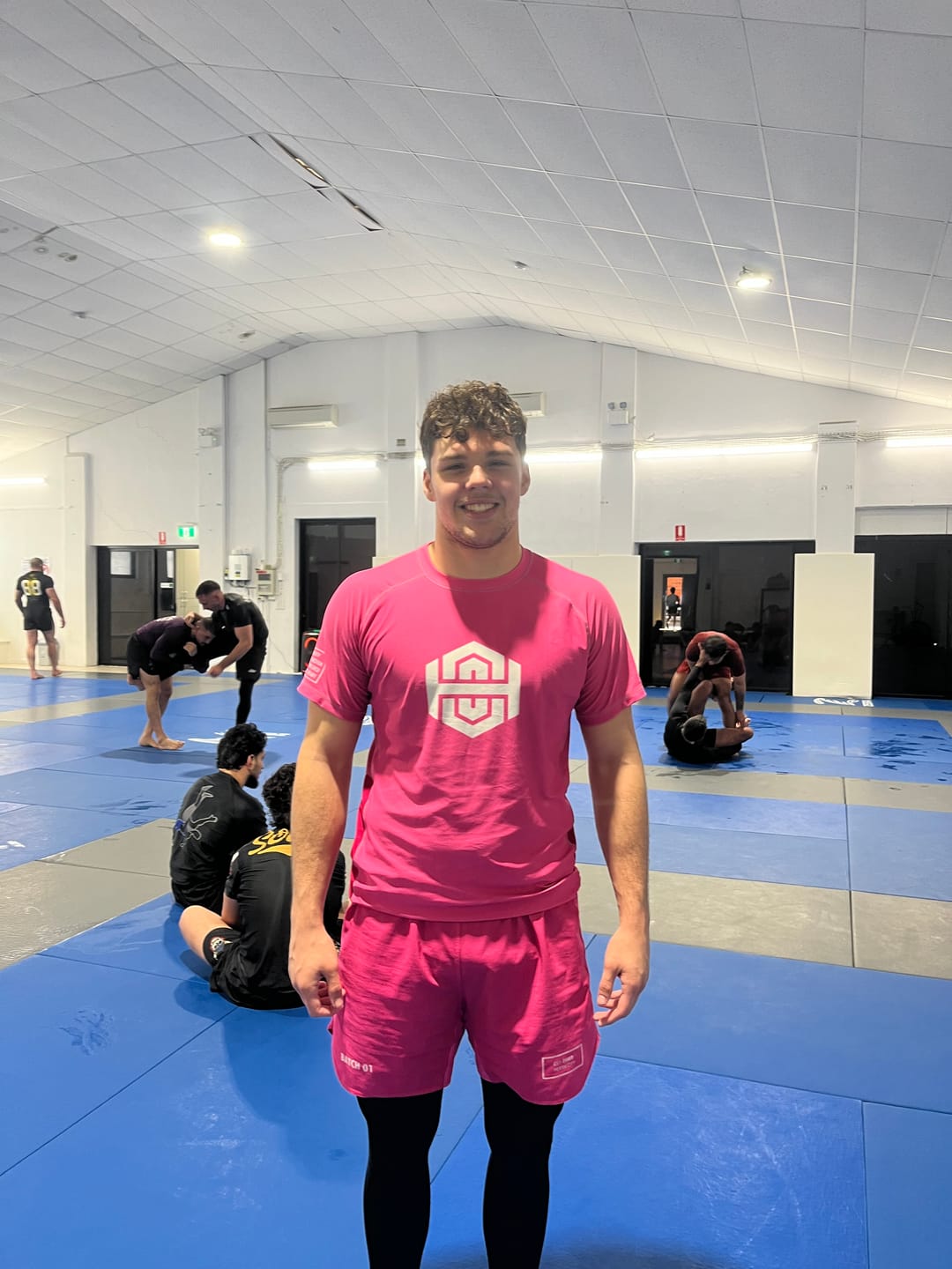 Customer photo review of Batch 01 SS BJJ Rash guard - Neon Pink