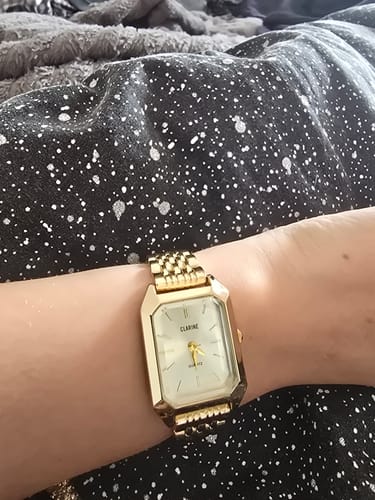 Customer wearing the vintage, gold CLAIRE DE MAINS watch, showing how it fits perfectly on their wrist.