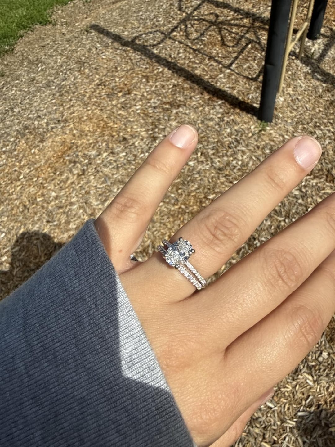 Customer photo review of S925 Half Halo Moissanite 0.5 Ct Round Cut White/Green Stone Anniversary Ring