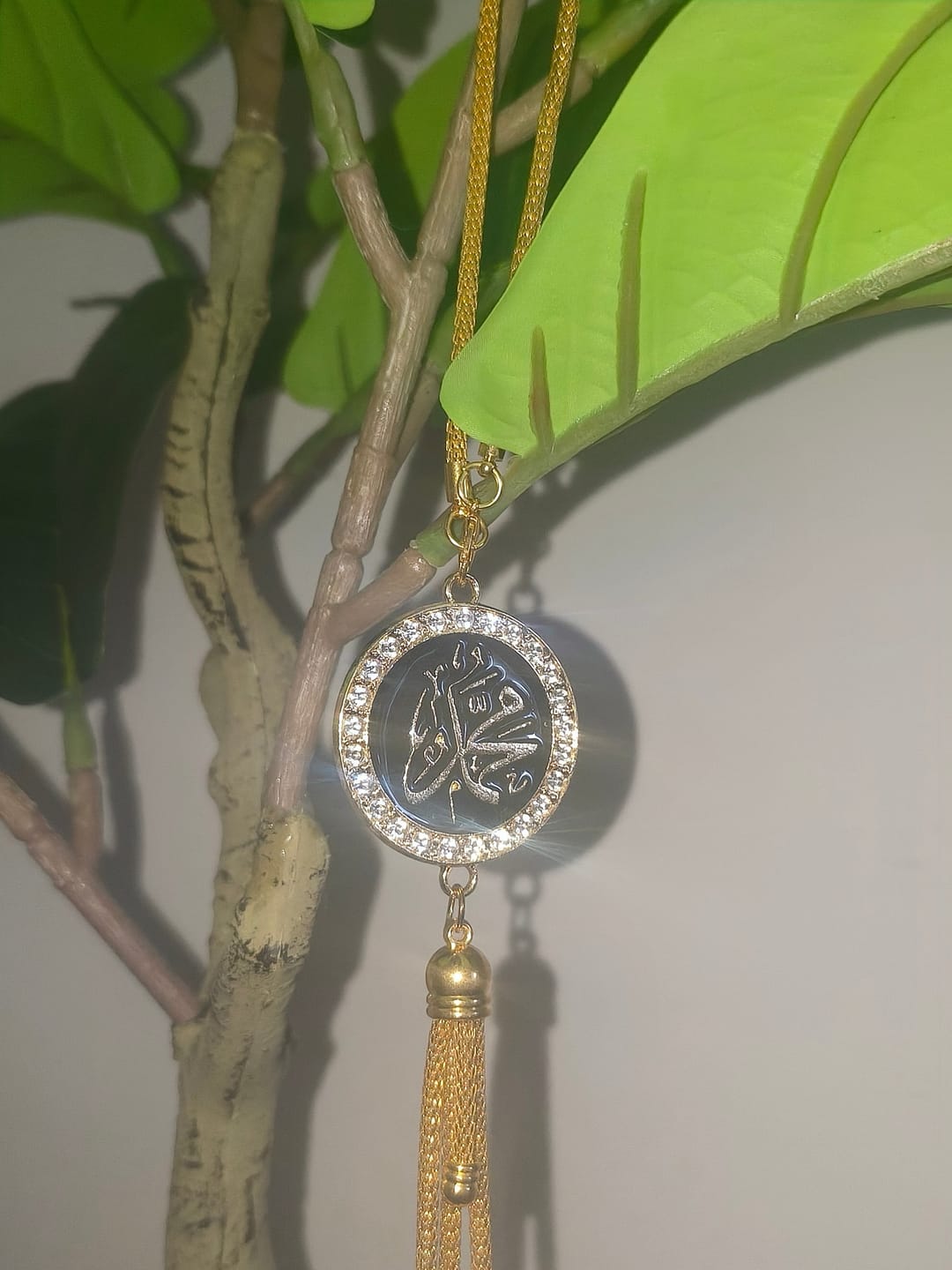 Customer photo review of HilalHaven Harmony Orb Allah Enamel Inscribed Car Pendant