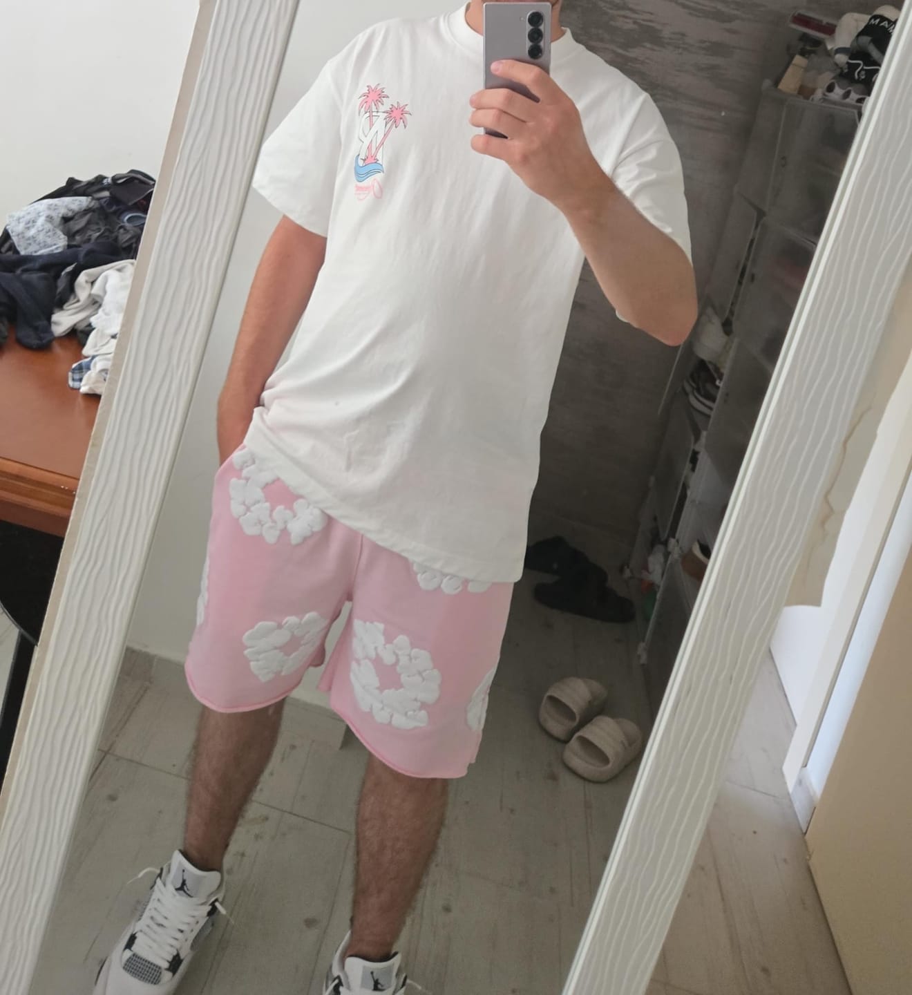 Customer photo review of DENIM TEARS | מכנס קצר ורוד