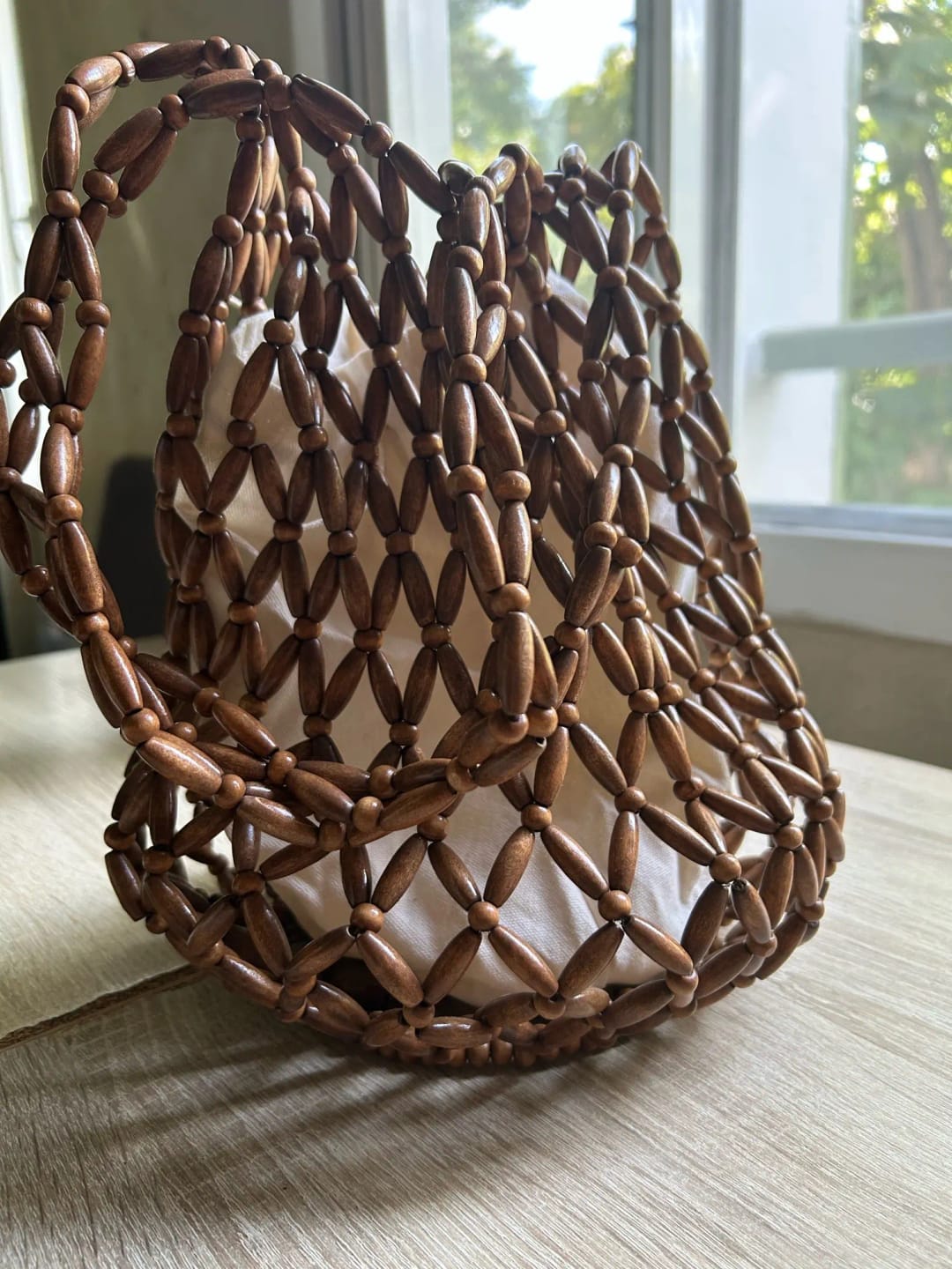 Customer photo review of Margot Woven Beaded Tote Bag
