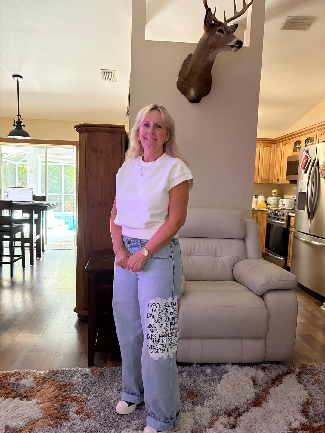 Customer photo review of 'Positive Vibes' Painted Levi's Jeans
