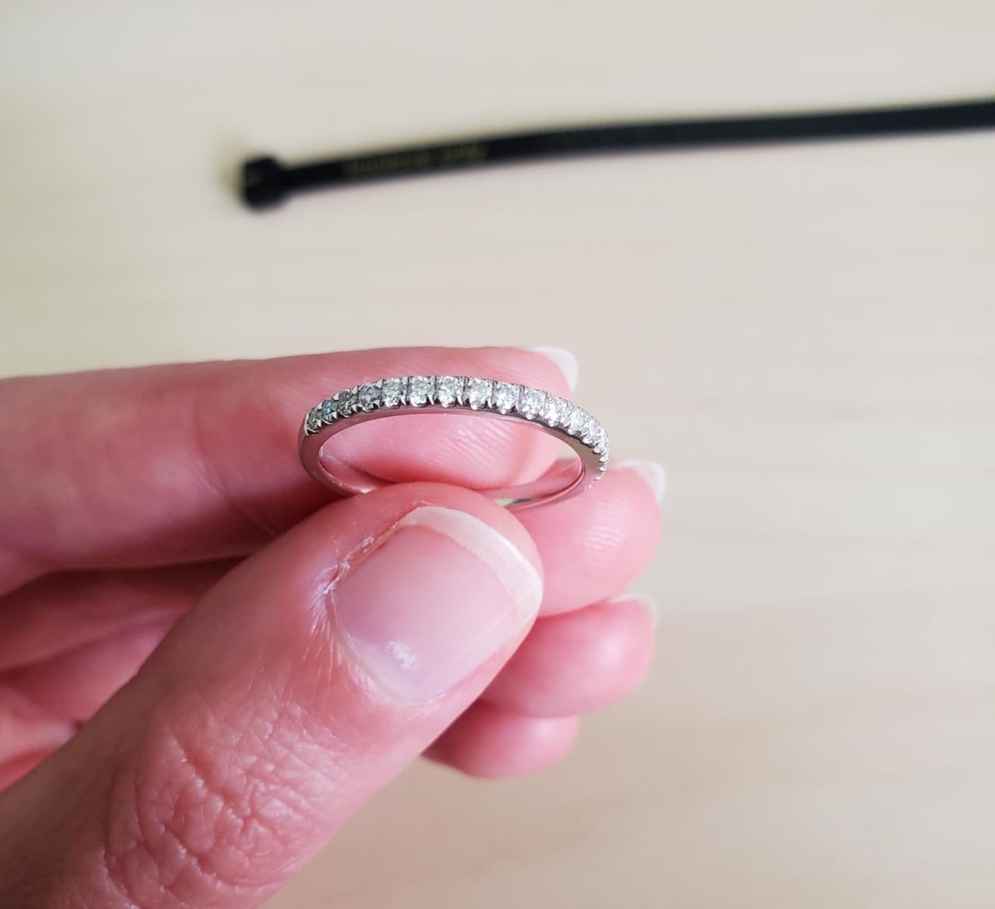 Customer photo review of S925 Half Halo Moissanite 0.5 Ct Round Cut White/Green Stone Anniversary Ring