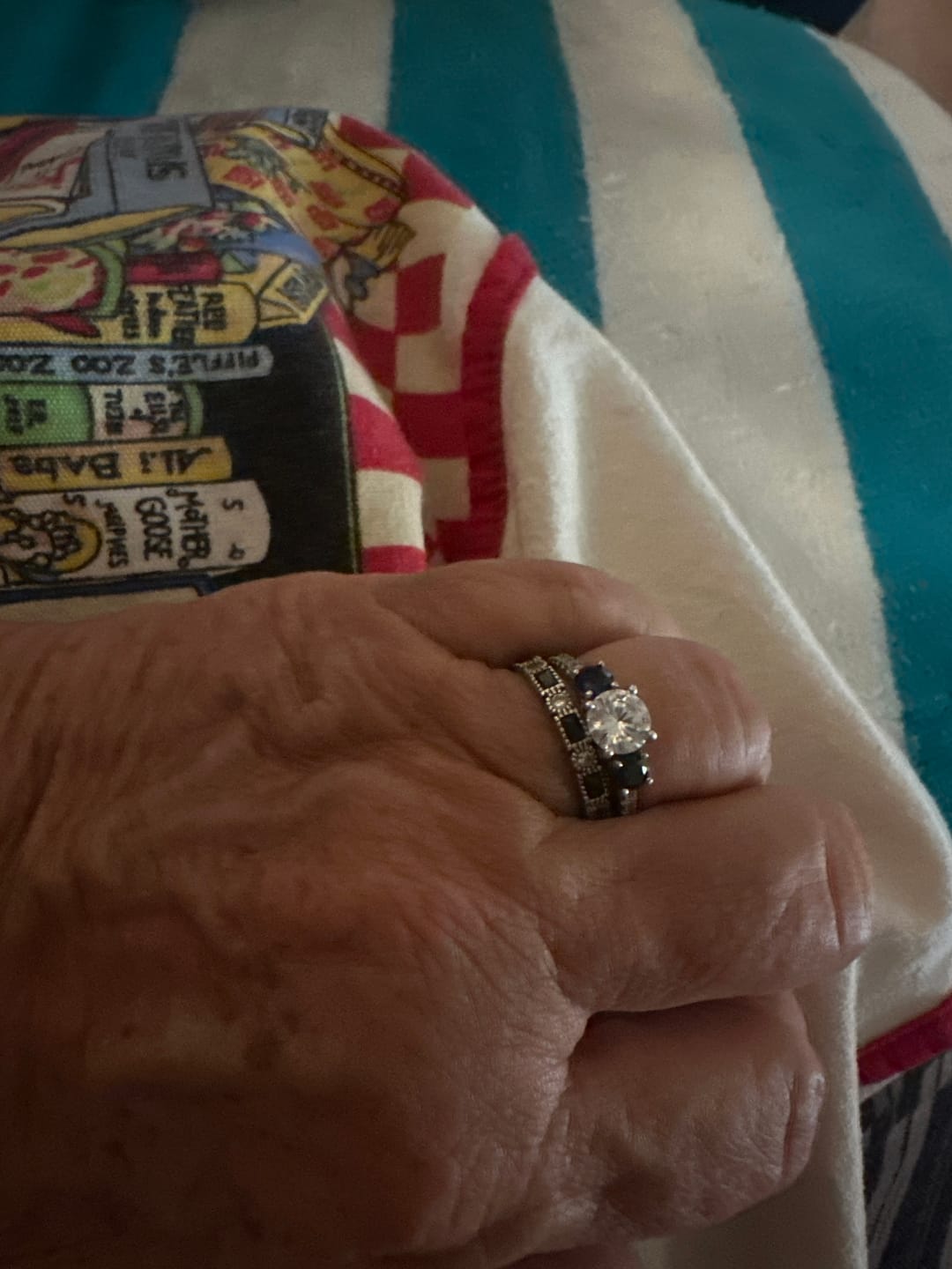 Customer photo review of Three Stone Moissanite and Blue Sapphire Pave Engagement Ring