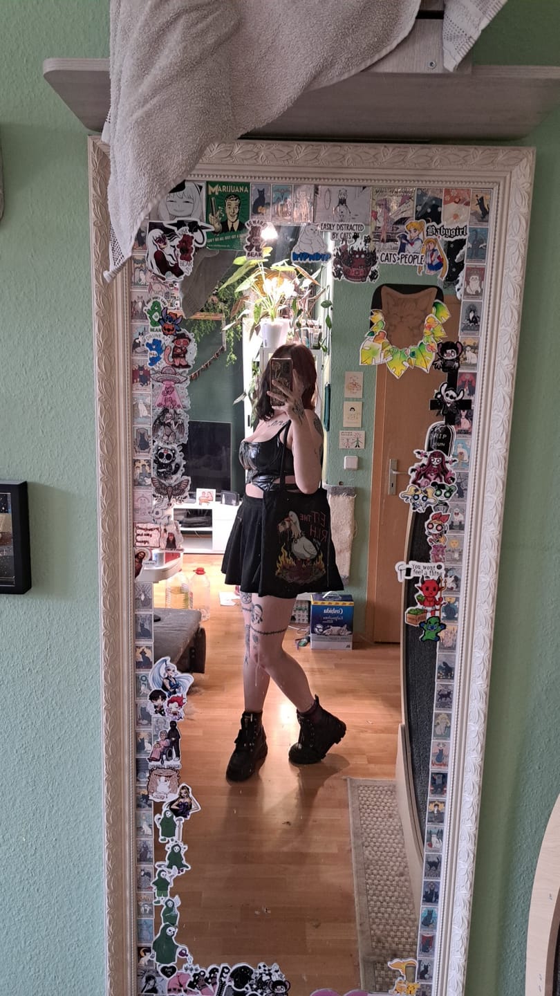 Customer photo review of Women's Grunge Front Zip Slip Faux Leather Vests