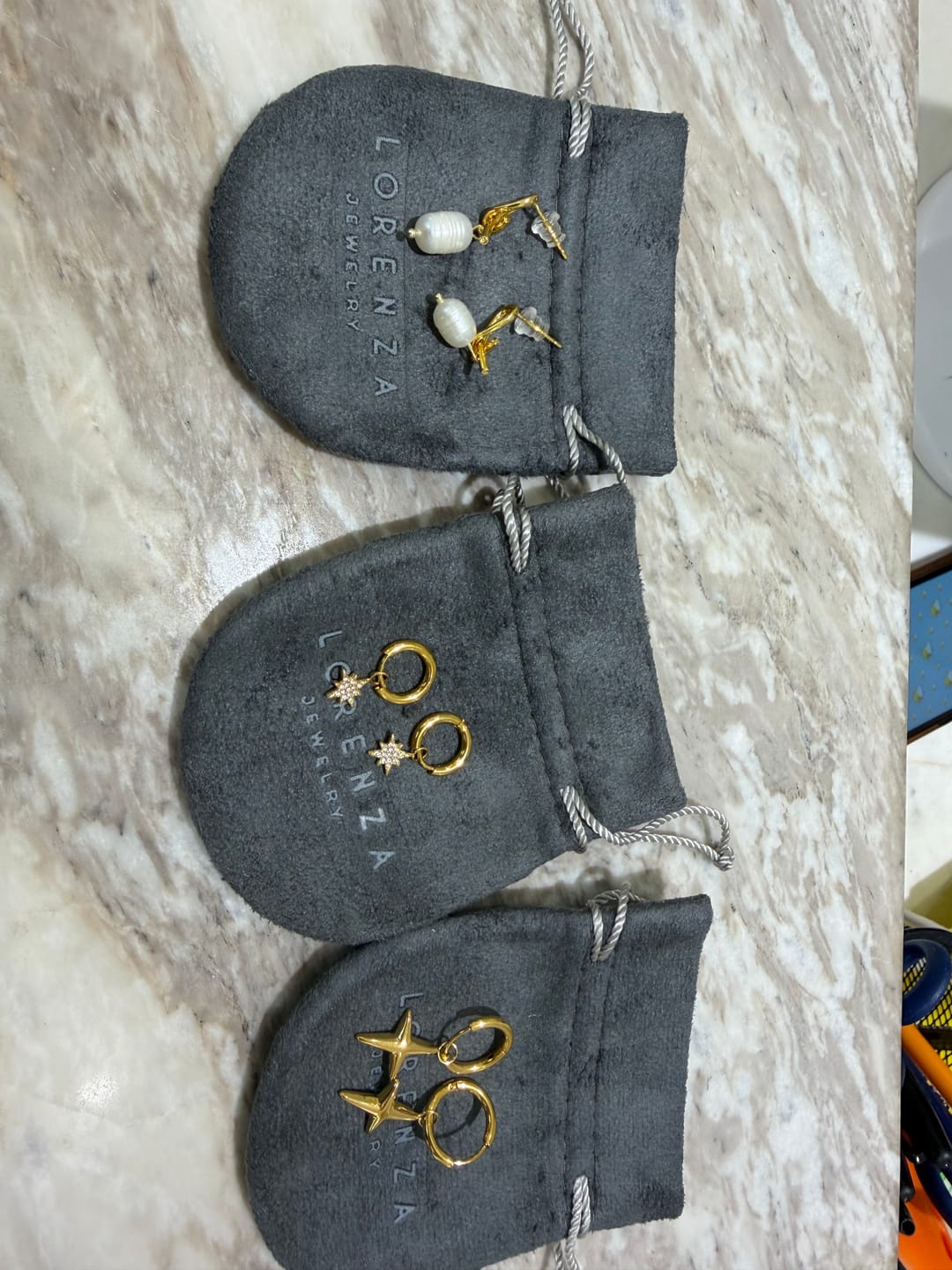 Customer photo review of Par Arracada Con Estrella 2 en 1