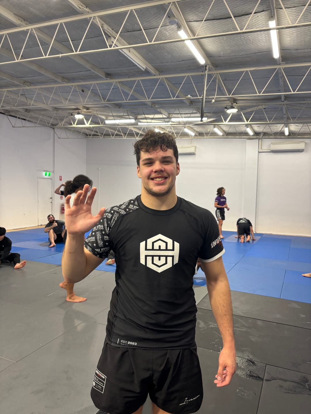 Customer photo review of JJDW BLACK SERIES - COMPETITION BJJ RASH GUARD - BLACK