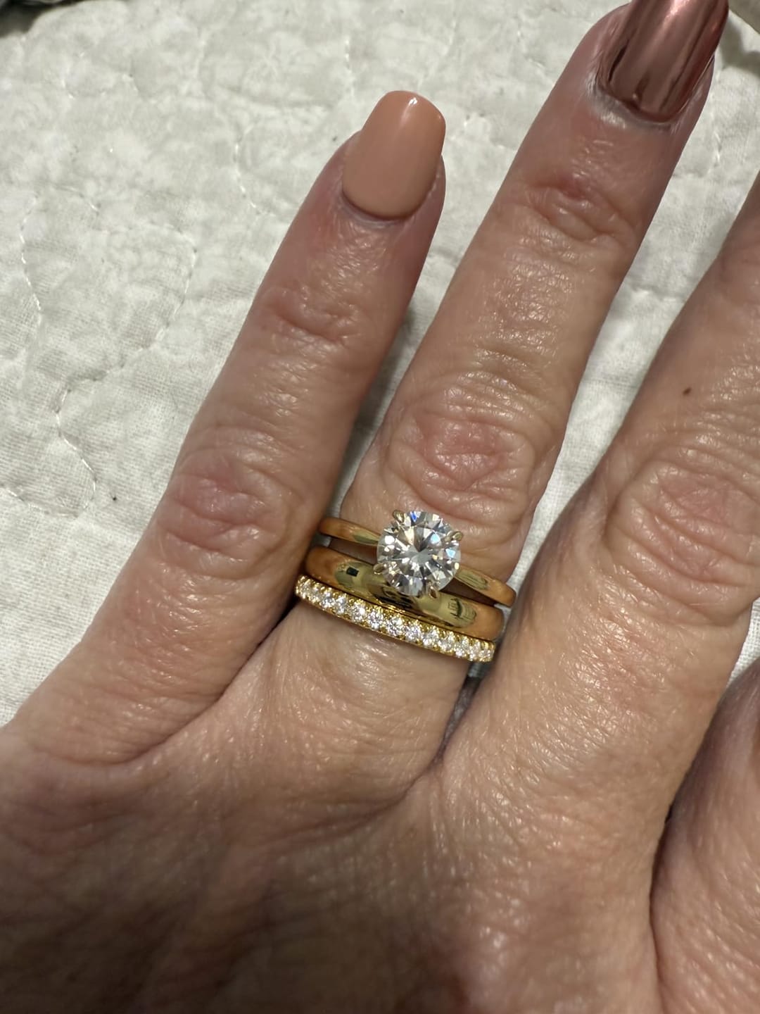 Customer photo review of Rodiffy Moissanite 0.5 Ct Round Cut Yellow Gold Anniversary Ring