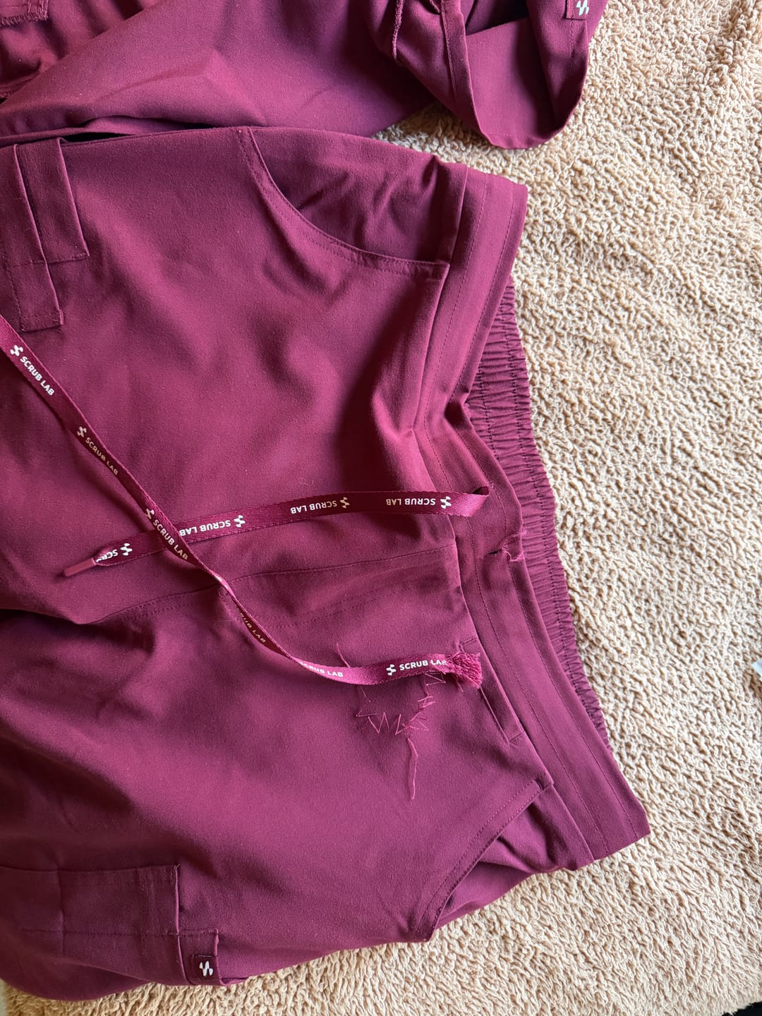 Customer photo review of CLARISSA Skinny Leg Scrub Pants - Maroon | SLTECH™