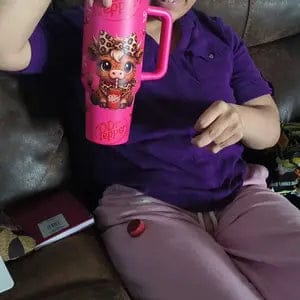 Customer photo review of Personalized Dr Pepper Highland Cow 40oz Tumbler With Handle Straw Lid Custom Name Leopard Red Bow Christmas Gingerbread Stainless Steel Insulated Mug Gift For Friends