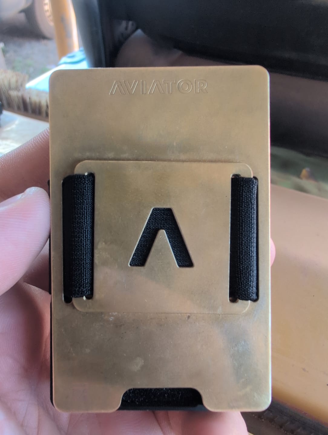 Customer photo review of Stonewashed Brass | Slide Wallet + Brass Cash Clip