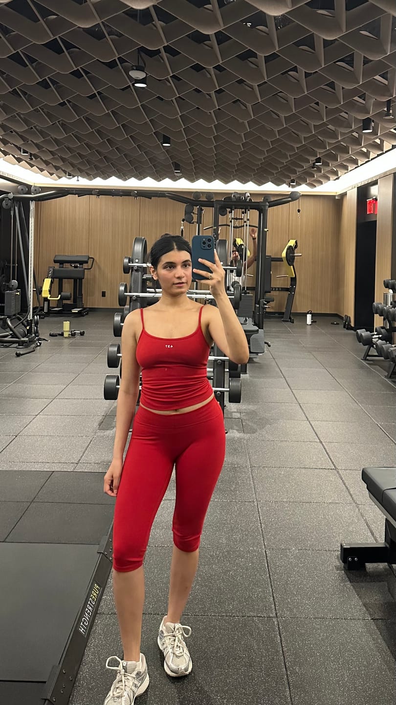 Customer photo review of The Minimalist Tank Scarlet