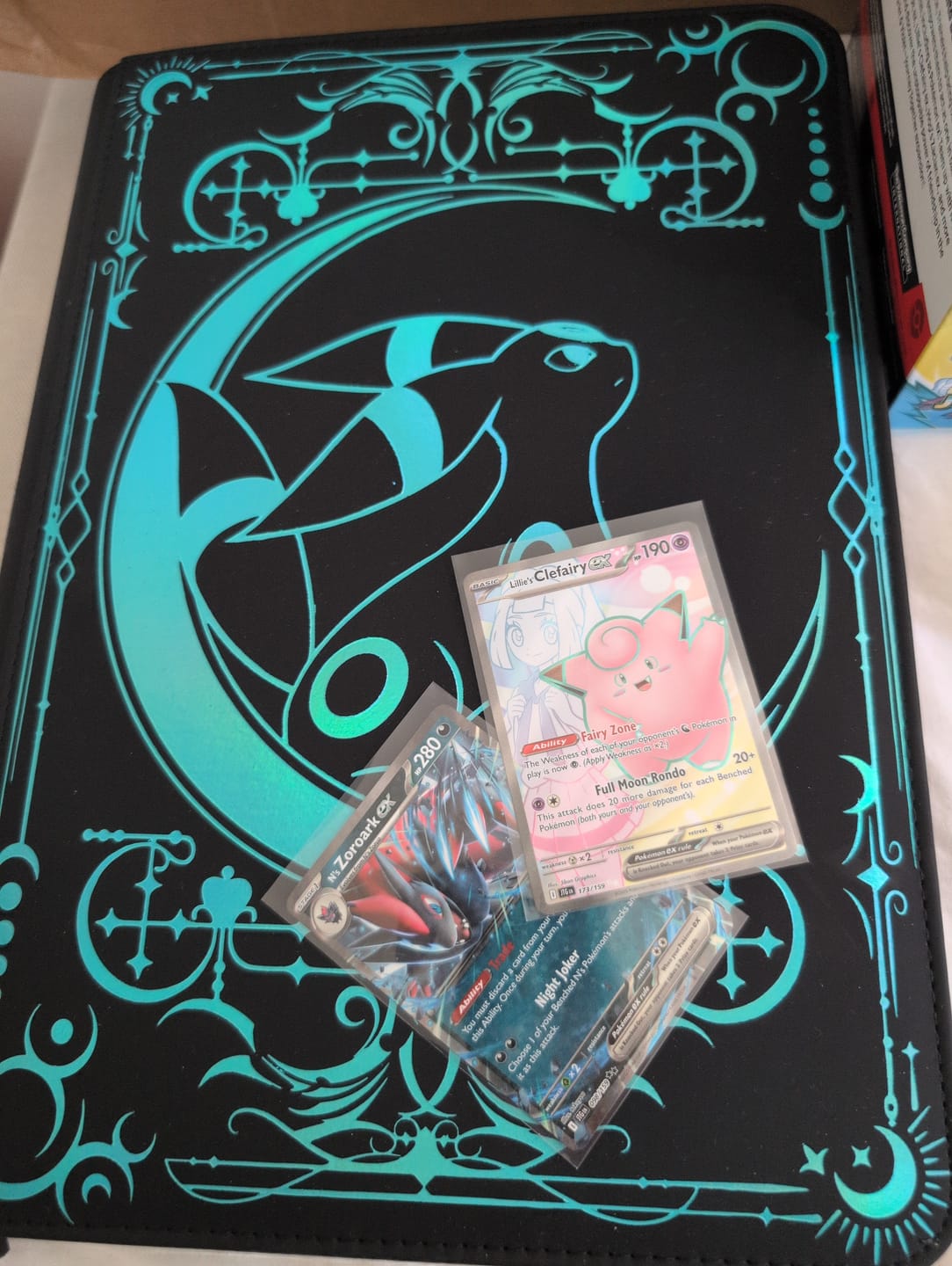 Customer photo review of Lunar Shadow Shiny 9-Pocket Trading Card Binder