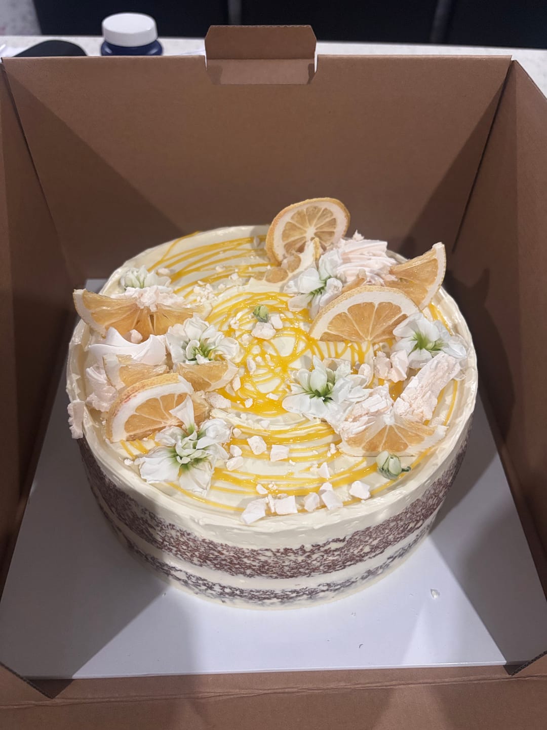 Customer photo review of lemon meringue cake