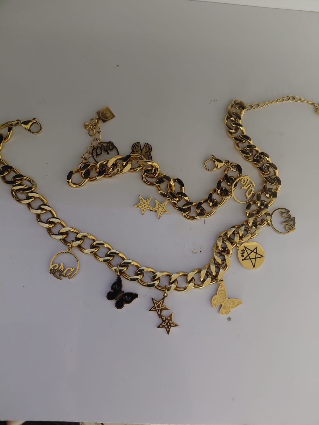Customer photo review of Gold Luxe Logo Hoops