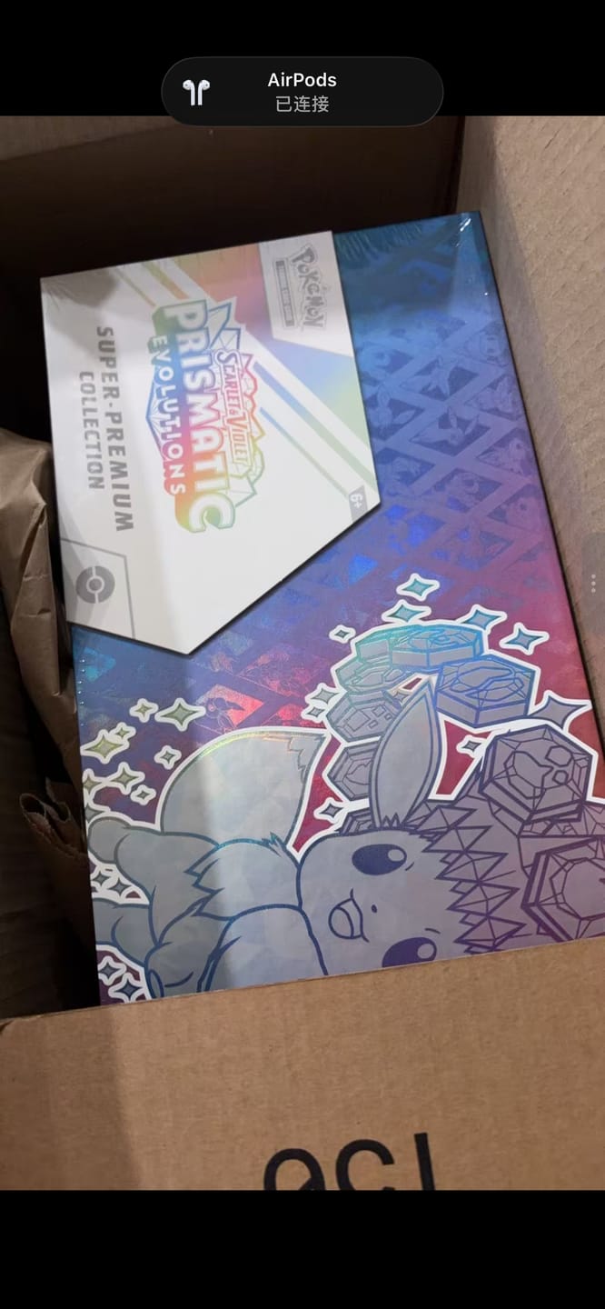 Customer photo review of Prismatic Evolutions Super-Premium Collection - SV: Prismatic Evolutions