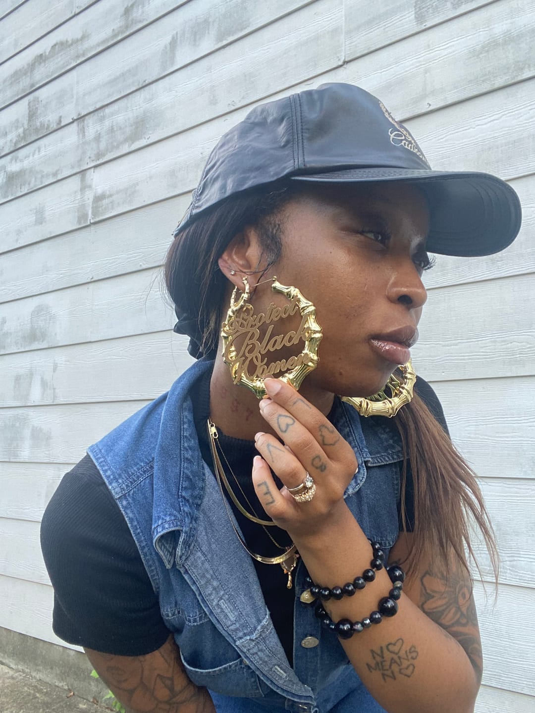 Customer photo review of 18k Gold Plated Protect Black Women Bamboo Hoop Earrings
